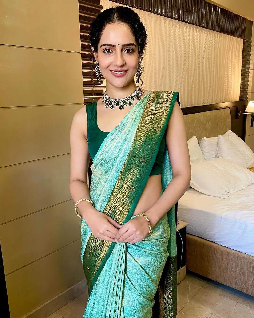 Malvi Malhotra Stills in Green Saree Sleeveless Blouse